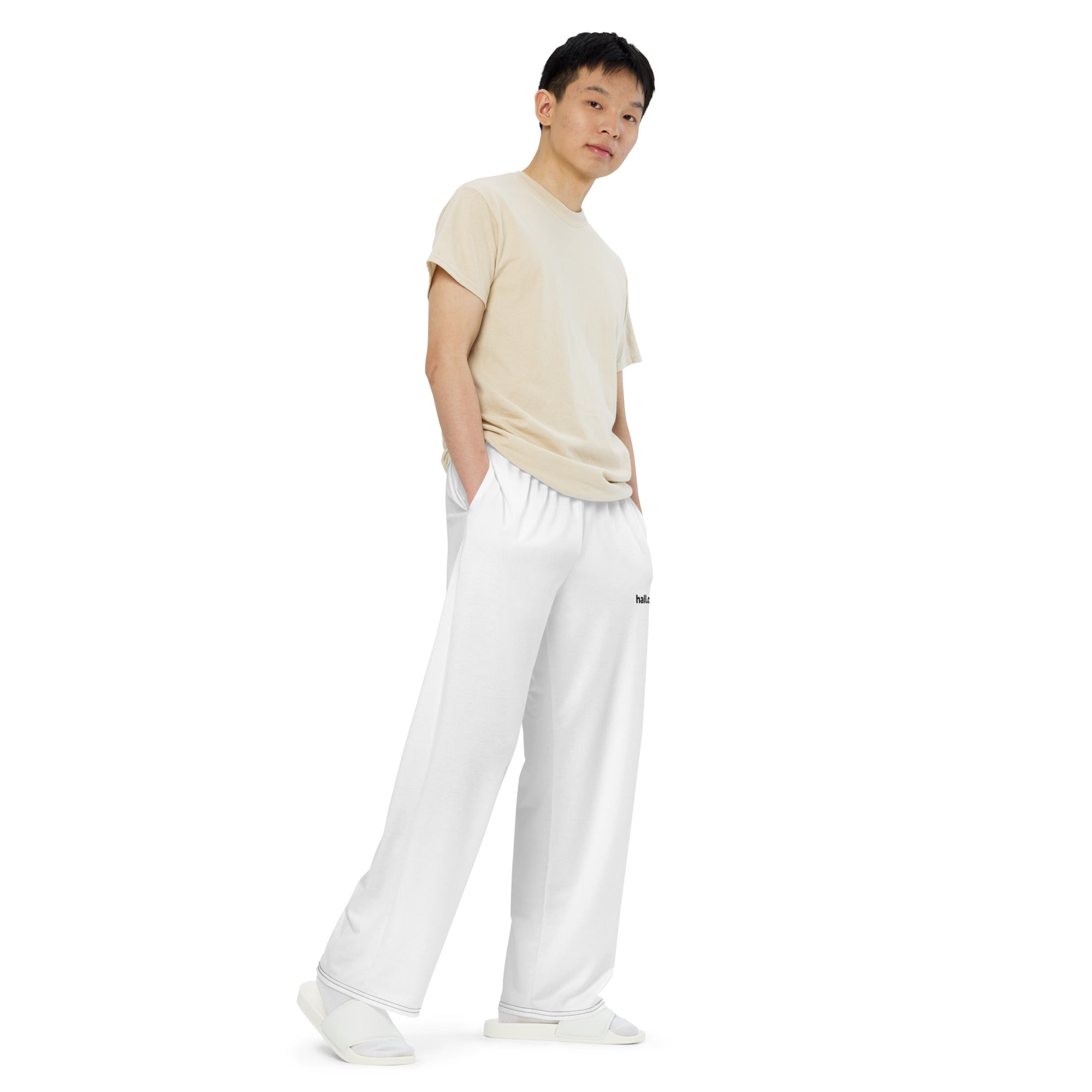 Unisex-Hose mit weiten Beinen und Allover-Druck: Weite Hose mit Logo - Hall.one