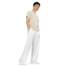 Unisex-Hose mit weiten Beinen und Allover-Druck: Weite Hose mit Logo - Hall.one